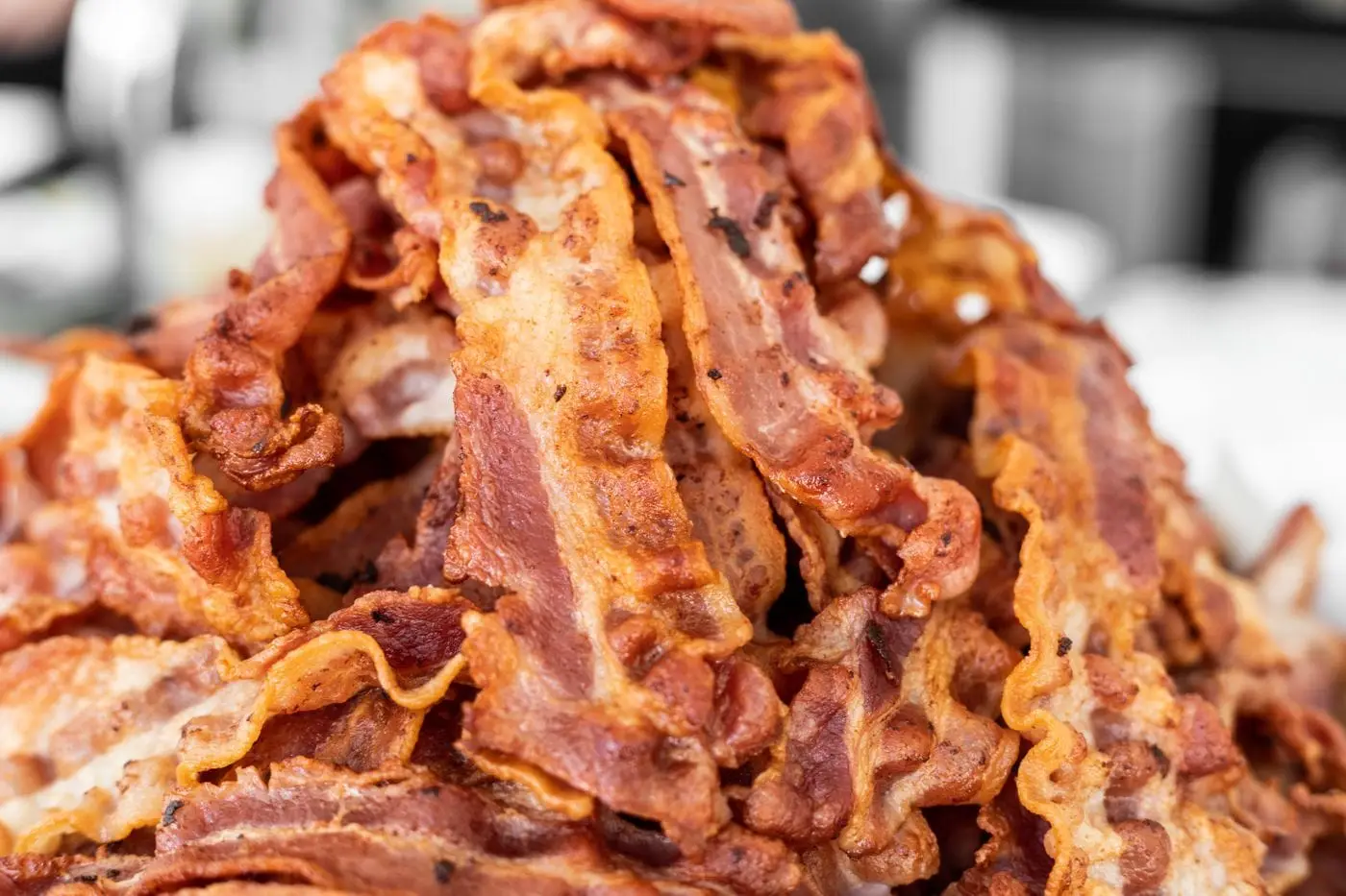 Close-up of a heap of crispy cooked bacon strips
